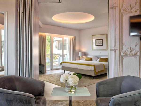 St George Lycabettus Lifestyle Hotel : photo 1 de la chambre suite deluxe avec balcon d'angle - vue sur colline du lycabette