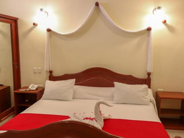 Villas Coco Resort - All Suites : photo 2 de la chambre suite lit king-size avec baignoire spa