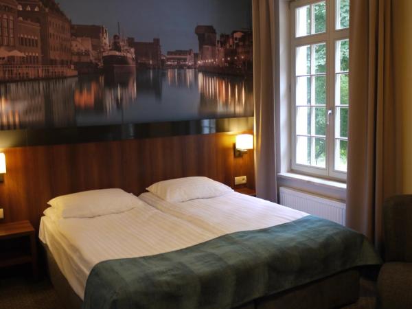 Apart Neptun : photo 6 de la chambre chambre double ou lits jumeaux classique