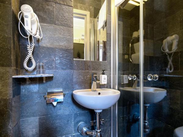 Rex Hotel : photo 3 de la chambre petite chambre simple