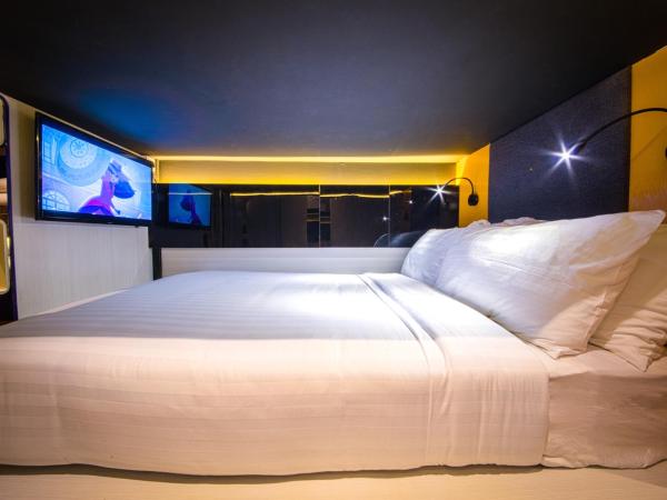 CUBE Family Boutique Capsule Hotel at Chinatown : photo 8 de la chambre chambre quadruple de luxe avec 2 lits queen-size