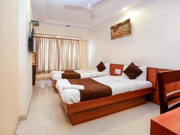 Lucky Hotel Goregaon : photo 1 de la chambre chambre double ou lits jumeaux supérieure