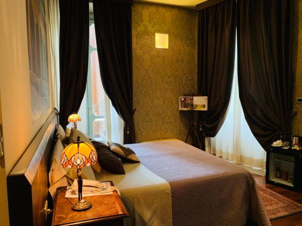 Hotel Dei Pittori : photo 10 de la chambre chambre familiale avec terrasse