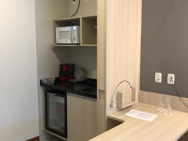 Boulevard Residencial : photo 10 de la chambre chambre lit queen-size avec balcon