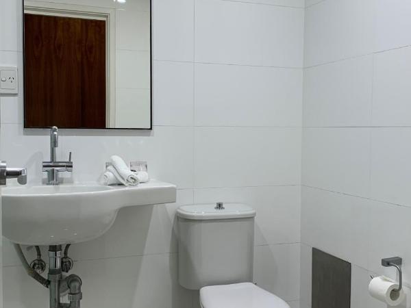 Cosmopolitan Hotel and Apartments : photo 1 de la chambre chambre lit king-size deluxe