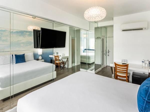 Penguin Hotel : photo 4 de la chambre chambre lit king-size - vue sur l'océan