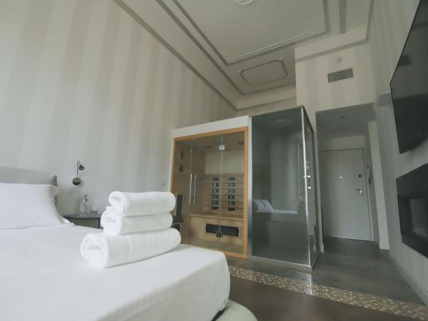 PORTA NUOVA SUITES : photo 3 de la chambre suite avec sauna