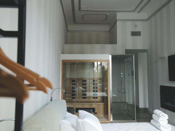 PORTA NUOVA SUITES : photo 2 de la chambre suite avec sauna