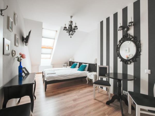 Ginger ApartHostel : photo 1 de la chambre chambre double ou lits jumeaux avec salle de bains commune