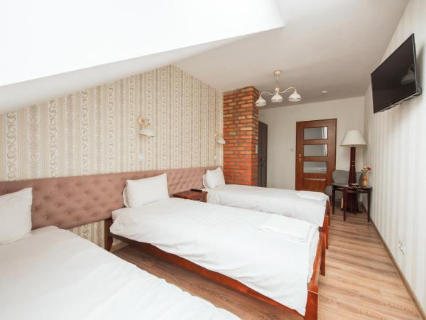 Ginger ApartHostel : photo 2 de la chambre chambre triple avec salle de bains commune