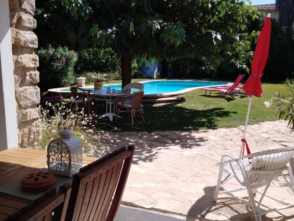 Sous le mûrier : photo 3 de la chambre chambre quadruple avec salle de bains privative séparée