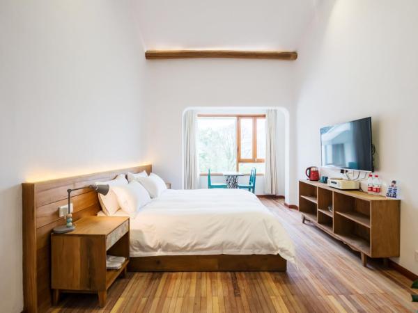 Hang Zhou Peach Guesthouse : photo 2 de la chambre chambre lit queen-size