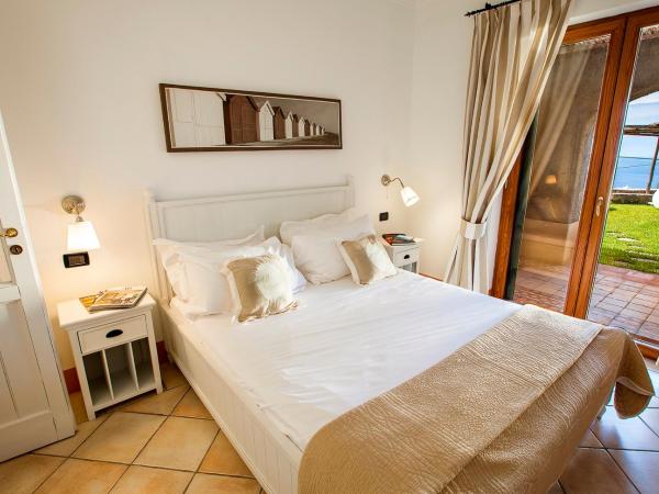 Tenuta Del Poggio Antico : photo 6 de la chambre suite deluxe - vue sur mer