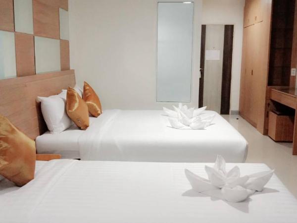 The Greenery central suite & hotel : photo 2 de la chambre chambre triple deluxe