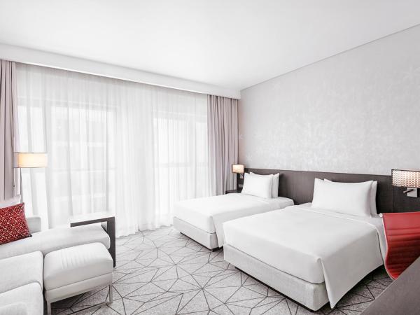 Hyatt Place Dubai Jumeirah : photo 6 de la chambre chambre lits jumeaux avec canapé-lit