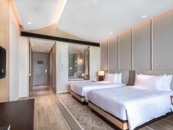 Narada Resort Hotel Sanya Pleasant Bay : photo 4 de la chambre chambre lits jumeaux de luxe