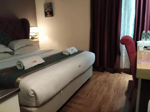 77 Boutique Hotel : photo 1 de la chambre deluxe king room with window