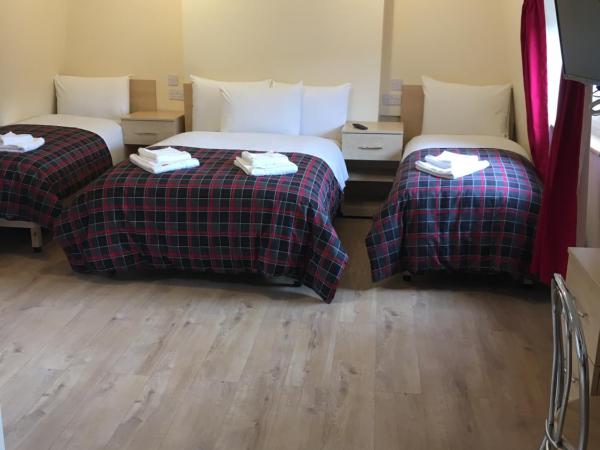 15 New Row : photo 4 de la chambre chambre quadruple avec salle de bains privative