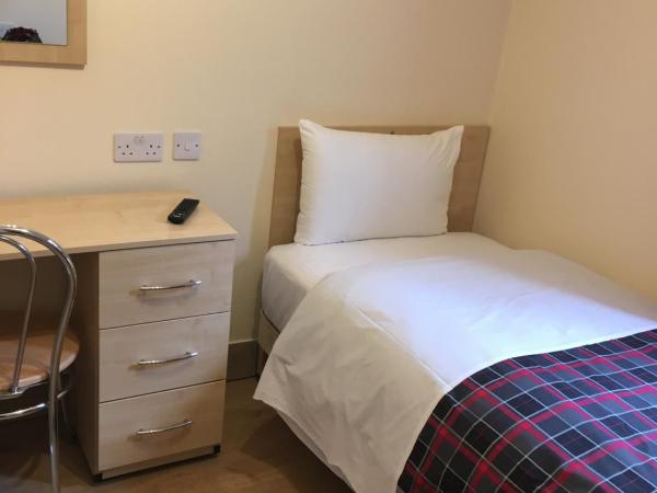 15 New Row : photo 2 de la chambre chambre simple avec salle de bains privative