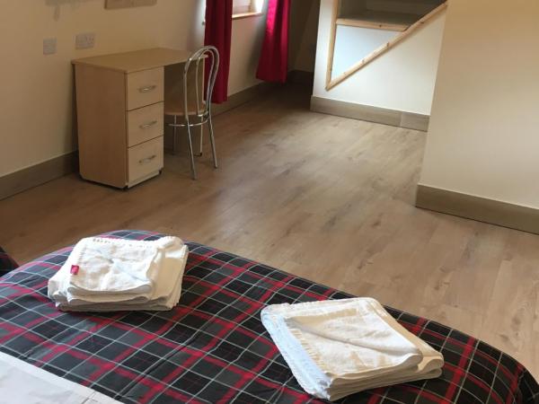 15 New Row : photo 2 de la chambre chambre quadruple avec salle de bains privative