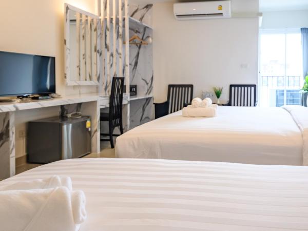 Donmueang Place Hotel - SHA Plus : photo 5 de la chambre chambre triple supérieure