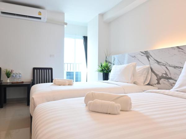 Donmueang Place Hotel - SHA Plus : photo 3 de la chambre chambre triple deluxe