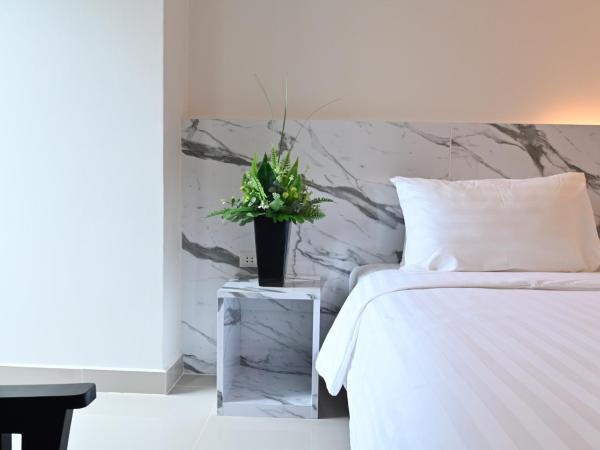 Donmueang Place Hotel - SHA Plus : photo 6 de la chambre chambre triple deluxe