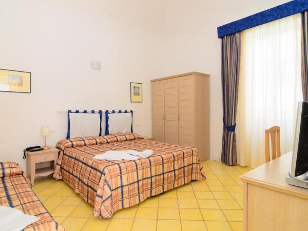 Albergo Villa Giusto : photo 1 de la chambre chambre familiale