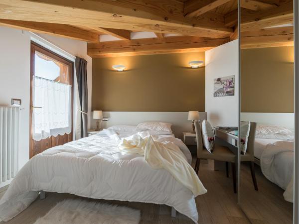 B&B Pousada Rio Aosta-servizi di Bed and breakfast : photo 1 de la chambre chambre lit king-size - vue sur montagne