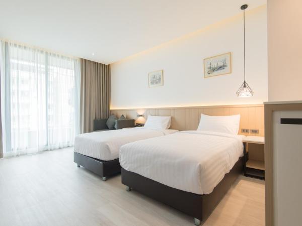 Madison Bangkok Hotel : photo 1 de la chambre chambre double supérieure avec deux lits doubles