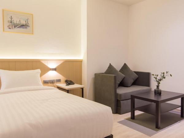 Madison Bangkok Hotel : photo 9 de la chambre chambre lits jumeaux - vue sur jardin