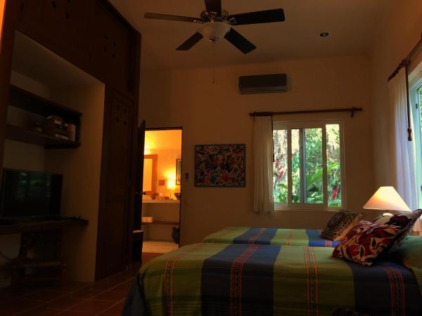 Casa Kin33 : photo 5 de la chambre chambre triple - vue sur jardin