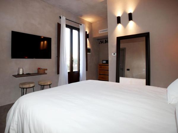 Casa Nostra Luxury Suites & Spa : photo 4 de la chambre suite deluxe avec baignoire spa