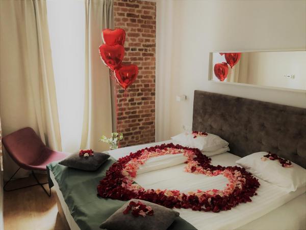 Cinema Apartments : photo 10 de la chambre appartement supérieur