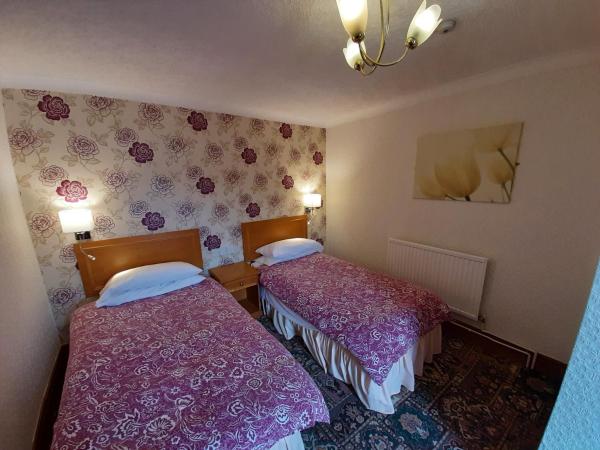 Cherry Blossom Inn : photo 5 de la chambre chambre lits jumeaux