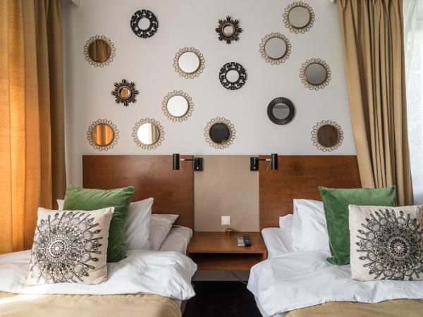 City Solei Boutique Hotel : photo 2 de la chambre chambre lits jumeaux confort