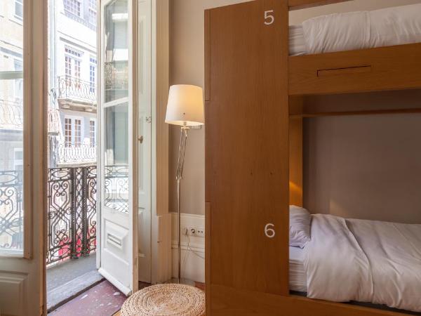 Being Porto Hostel : photo 8 de la chambre lit dans dortoir pour femmes de 4 lits