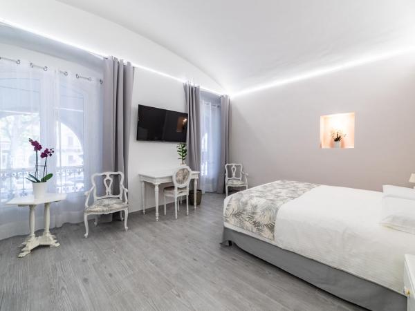 Re Vittorio : photo 9 de la chambre grande chambre double 