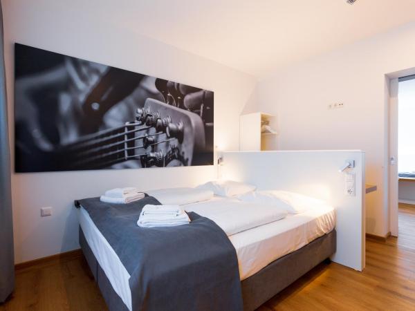 mk hotel münchen max-weber-platz : photo 2 de la chambre chambre triple standard