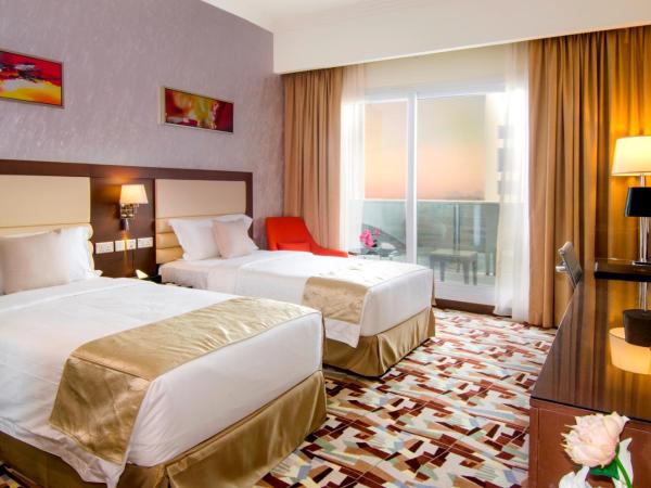 Al Murooj Grand Hotel : photo 2 de la chambre chambre lits jumeaux avec balcon