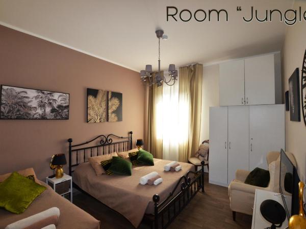 Room & Breakfast Nettuno 29 : photo 5 de la chambre chambre triple avec salle de bains privative séparée