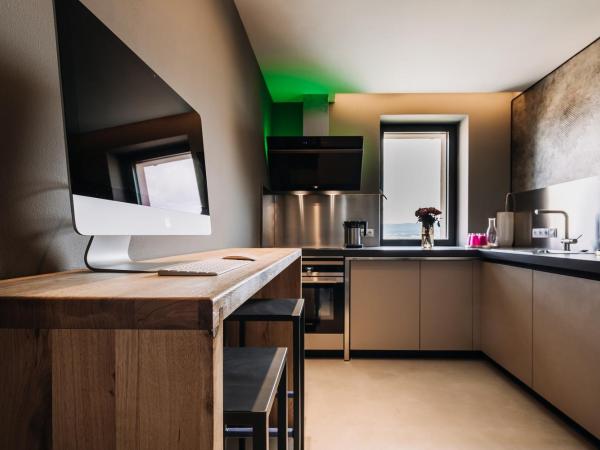 VILLA BRICOLA - Boutique Apartments : photo 10 de la chambre appartement supérieur