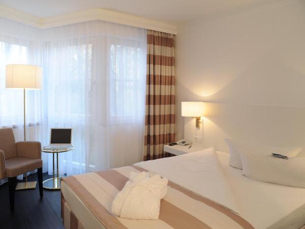 relexa Waldhotel Schatten Stuttgart : photo 3 de la chambre chambre simple supérieure