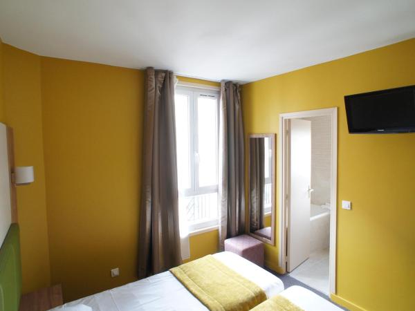 Hôtel De France : photo 8 de la chambre chambre lits jumeaux