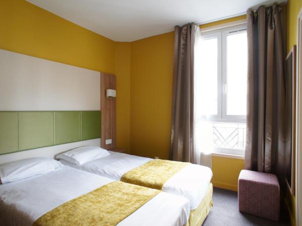 Hôtel De France : photo 6 de la chambre chambre lits jumeaux