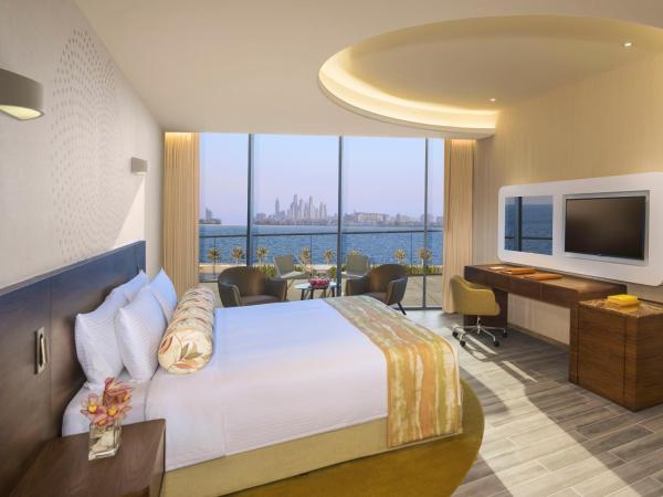 The Retreat Palm Dubai MGallery by Sofitel : photo 1 de la chambre suite 1 chambre avec lit king-size et accès à la plage privée - vue sur mer et palm jumeirah - accès au salon club