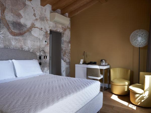 Locanda delle Mercanzie : photo 1 de la chambre chambre double supérieure