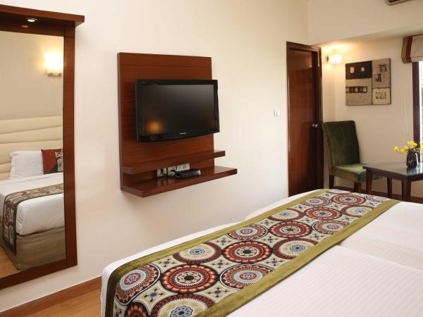 Ahuja Residency Sunder Nagar : photo 2 de la chambre chambre deluxe double ou lits jumeaux