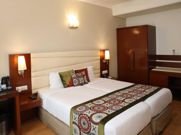 Ahuja Residency Sunder Nagar : photo 3 de la chambre chambre deluxe double ou lits jumeaux