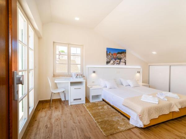 Idassa Atrium rooms : photo 3 de la chambre chambre double ou lits jumeaux avec terrasse